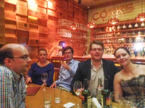 Jasper, Mike, Ludwig and Marthe enjoy an evening of wine tasting at EUCO